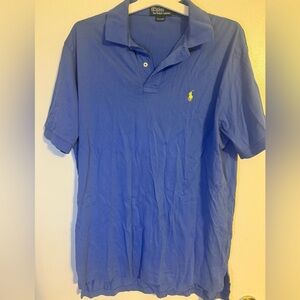 Blue Polo Ralph Lauren polo shirt in a good condition, fitting the size.